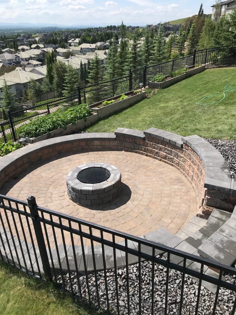 Circular patio with stone fire pit